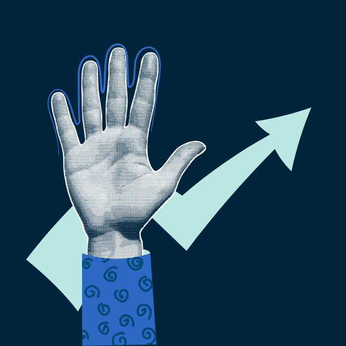 cutout of a raised hand in front of an arrow